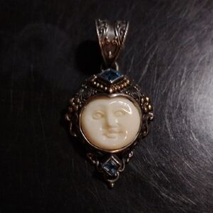 Bali Designs Oxidized Sterling Silver Bone Carved Moon Face Pendant W/Topaz